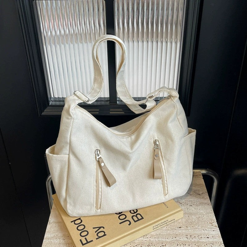 GUCSELECTED(B2109) กระเป๋าสะพายข้างผ้าแคนวาส-ข้างหน้ามี2ช่องซิปใส่ของ