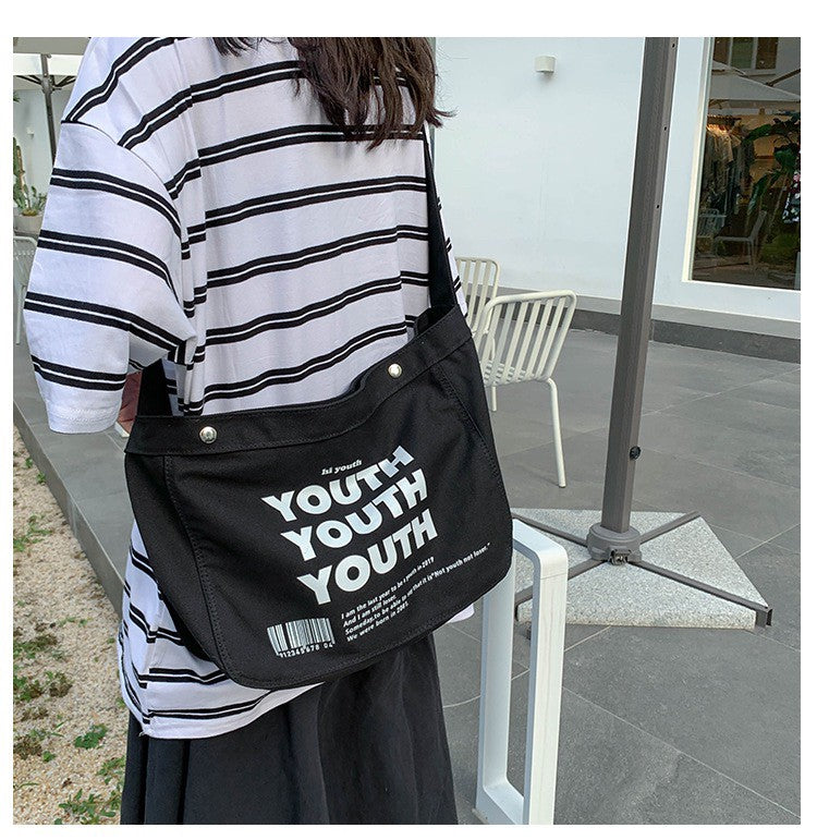 GUCSELECTED(B1775) กระเป๋าผ้าสะพายข้าง YOUTH ผ้าแคนวาส ผู้ชาย ผู้หญิง ใบใหญ่มี2สี