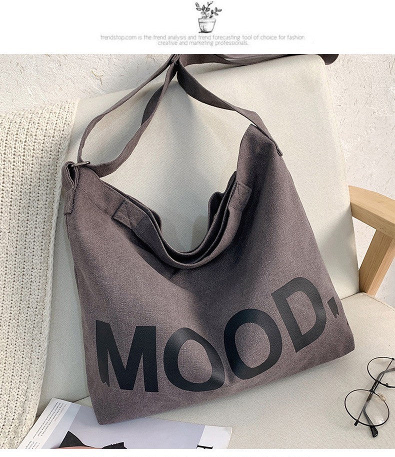 GUCSELECTED(B1813) กระเป๋าผ้าสะพายข้าง MOOD.ผ้าแคนวาส ผู้ชาย ผู้หญิง อินเทรนด์ญี่ปุ่น มี3สี